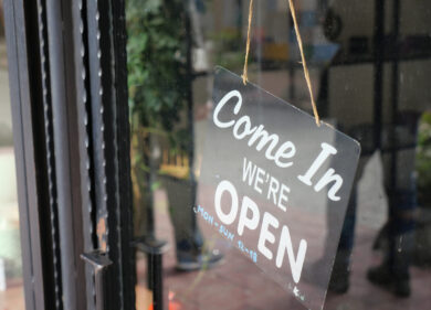 Come in and shop at local store with open sign